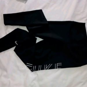 Nike leggings all black with silver letters size s
